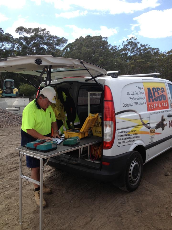 Technician completing test and tag checks